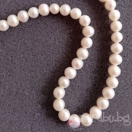 Естествени сладководни кръгли перли - натурално бели 7х8 мм (1бр)